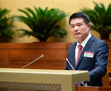 Viện trưởng VKSND tối cao Nguyễn Huy Tiến trình bày Tờ trình về dự thảo Nghị...